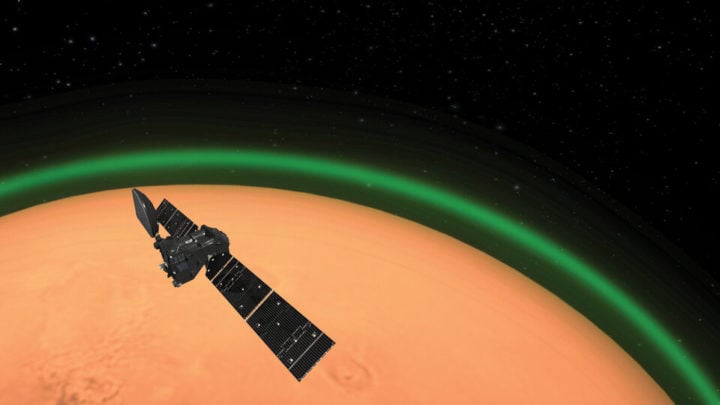 Artist's image of the ExoMars Trace Gas Orbiter looking at green oxygen in daylight on Mars