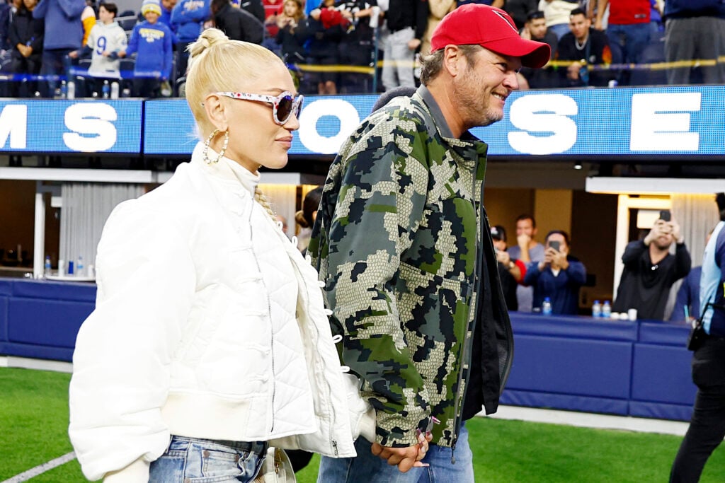 Gwen Stefani and Blake Shelton at a sports stadium in 2022.