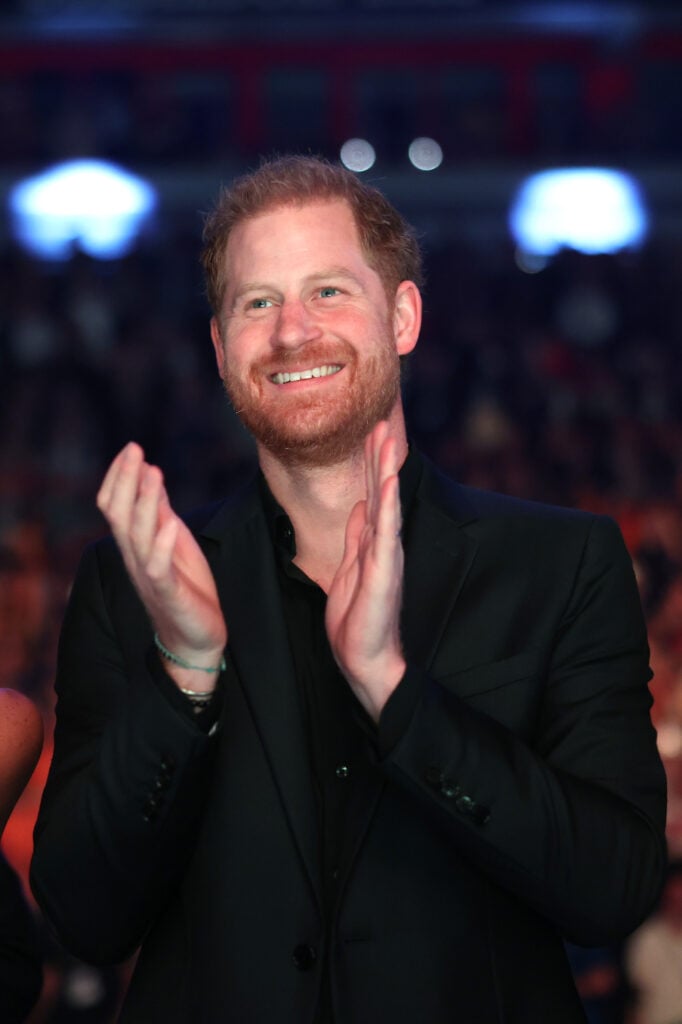 Prince Harry smiled and clapped in September 2023.
