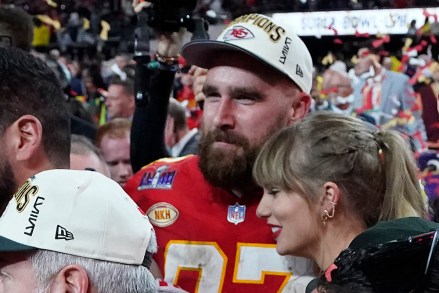 Kansas City Chiefs tight end #87 Travis Kelce and American singer-songwriter Taylor Swift embrace while celebrating the Chiefs winning Super Bowl LVIII against the San Francisco 49ers at Allegiant Stadium on February 11, 2024 in Las Vegas, Nevada.  (Photo by Timothy) A.  Cleary/AFP) (Photo by Timothy A. Cleary/AFP via Getty Images)