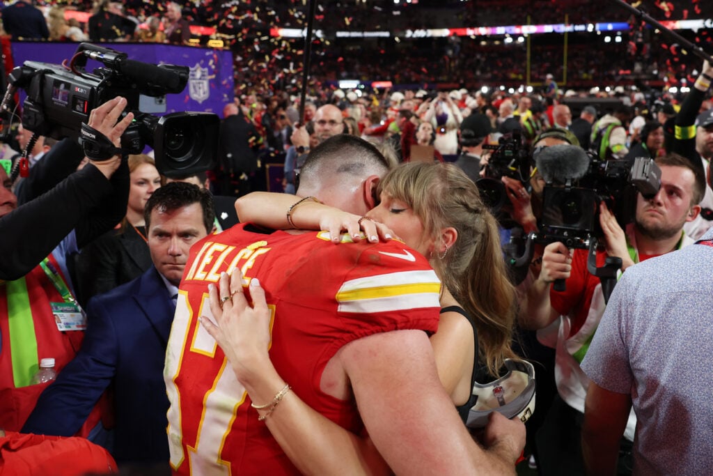 Travis Kelce embraces Taylor Swift after defeating the San Francisco 49ers 25-22 during Super Bowl LVIII at Allegiant Stadium on February 11, 2024 in Las Vegas, Nevada. 