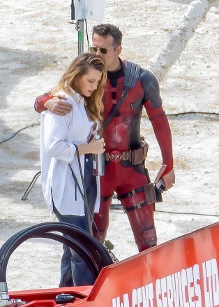 London, United Kingdom - *Exclusive* - Blake Lively visits the set of Deadpool 3 with her sisters Lori and Robin and their castmates and Ryan Reynolds plants a kiss on her head while dressed up as Deadpool.  Ryan's daughter was spotted with a cute Wolverine toy as she talked to her dad!  Strange!  They're shooting in London for the new Deadpool movie.  Pictured: Ryan Reynolds, Blake Lively, Lori Lively, Robyn Lively Backgrid USA July 12, 2023 Byline Must Read: Click News & Media / Backgrid USA: +1 310 798 9111 / usasales@backgrid.com UK: +44 208 344 2007 / uksales @backgrid.com *UK customers - photos with children please pixelate faces before publishing*