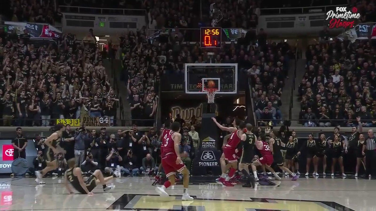 Purdue's Fletcher Lauer knocks down a 3-pointer while fouled against Indiana